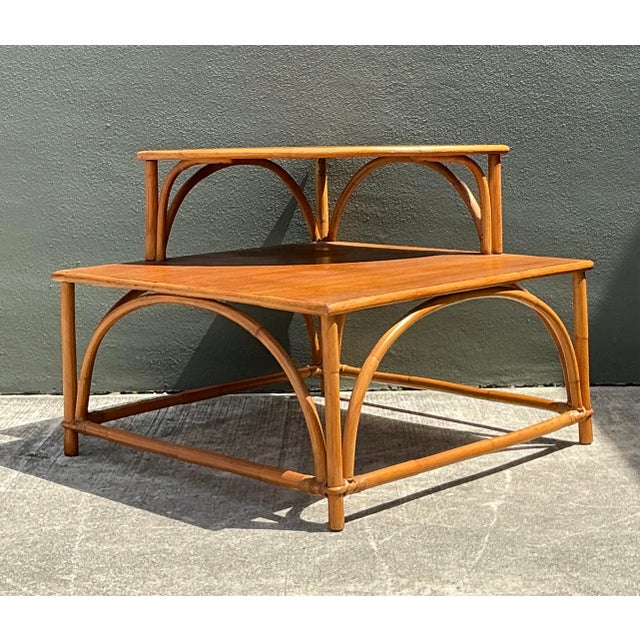 This iconic Mid-Century Modern corner table is a masterclass in organic design and functional elegance. Crafted with a...