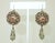 Lovely collage earrings by Jill Schwartz for her jewelry line, Elements. These drop dangle earrings have a romantic...