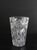 A beautiful handmade crystal glass vase. Circa 1960s. The traditional craft of glassblowing and glass cutting turns...