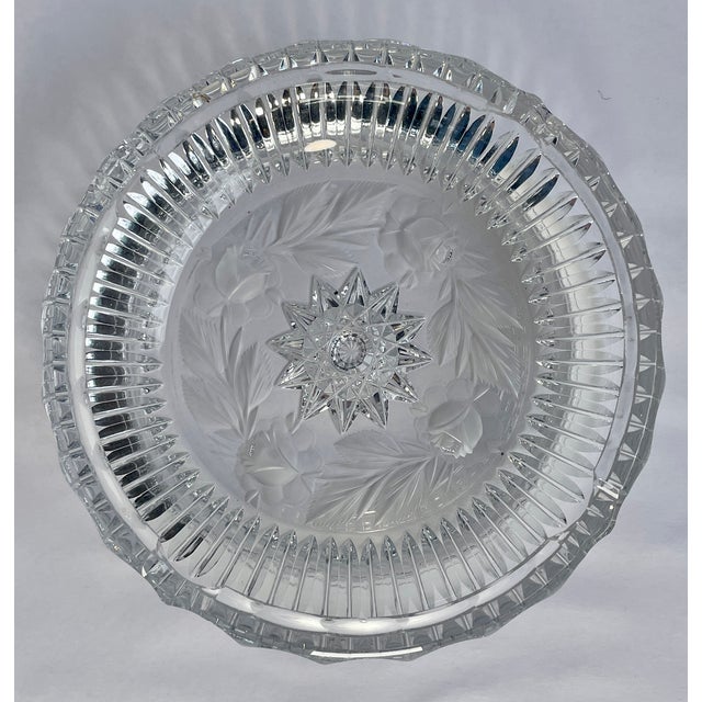 This is a hand-cut chunky decorative crystal bowl with deep designs and frosting in the flowers. It doesn’t have any...