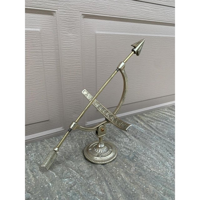 A beautifully crafted silvered brass armillary half-sphere, evoking the timeless elegance of classical European gardens....