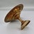 A striking Italian brass-finished pedestal tazza with a wide, shallow bowl and elegant gadroon detailing along both the...