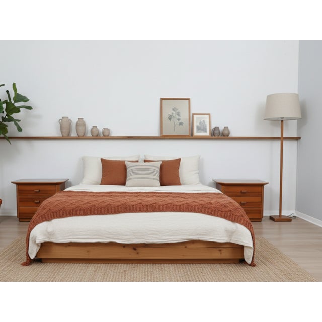 This pair of late 1970s bedside tables represents a flawless blend of late-century rigor and timeless craftsmanship....