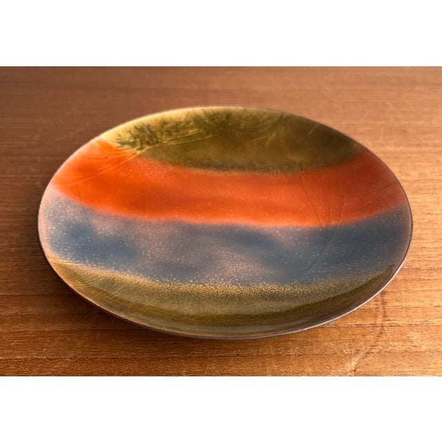 This Bovano trinket tray is bursting with personality with vermilion, gold and powder blue tones. Designed with enamel on...