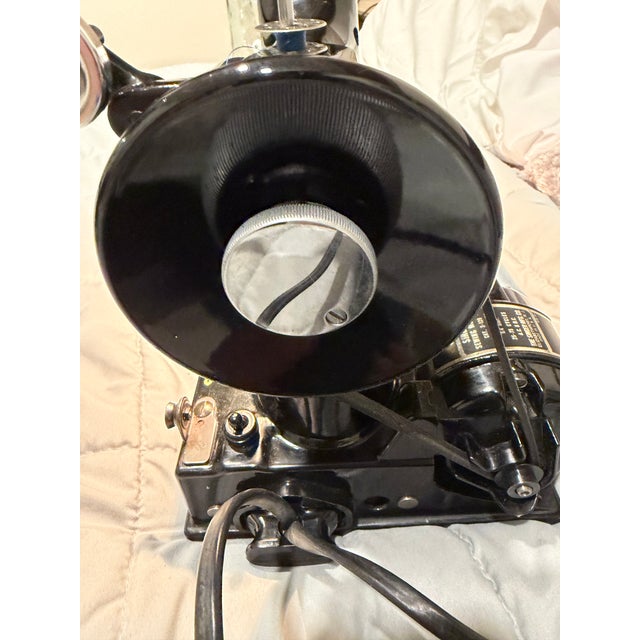 Vintage 1951 singer featherweight sewing machine, which is in what sewing machine terms are mint condition all paint in...