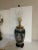 Vintage Chinoiserie table lamp. Vase form with flower design. measures 16" tall to the top of the porcelain and 27" to the...