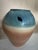 A large ovoid stoneware vase by American studio potter Mark Untener, c. 1990s–2000s. The shoulder carries a deeply carved...