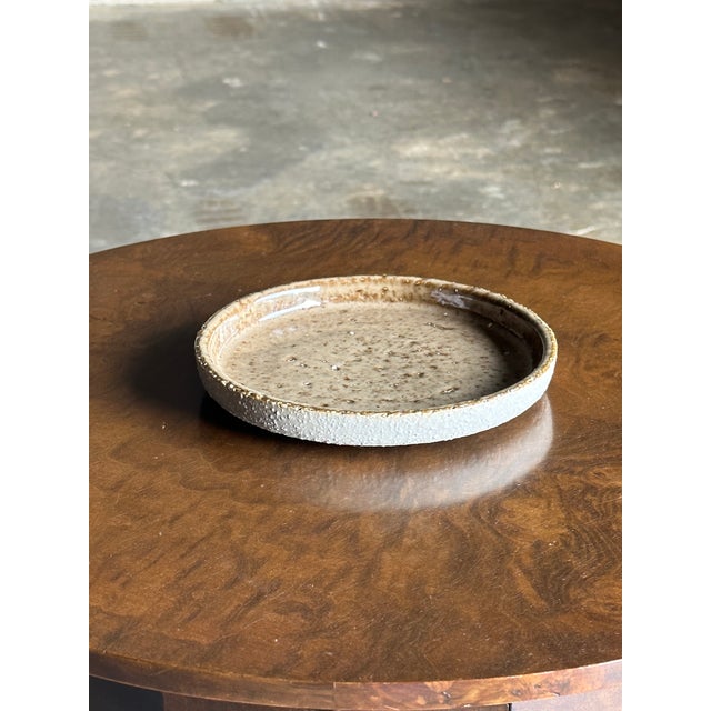 A wonderful low dish, designed by Hertha Bengtson for Rorstrand. Would work well as a vide poche/ catchall. Great organic...