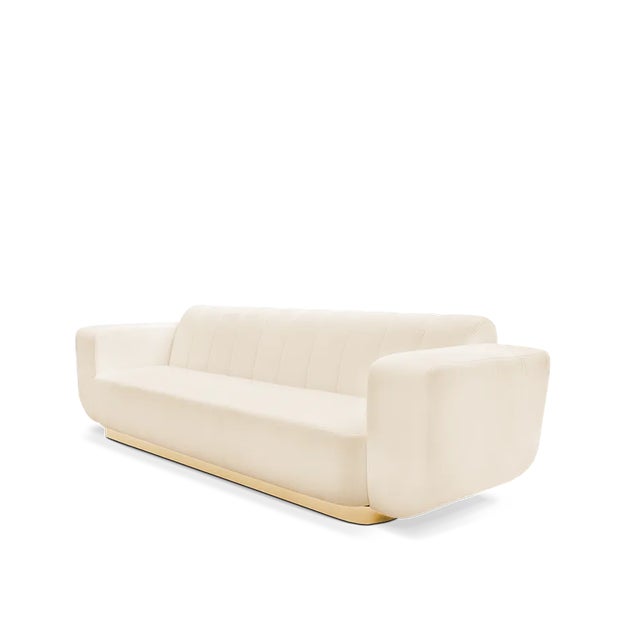 A sofa that combines some details from mid-century style with a contemporary design vision. The base is rectangular, but...