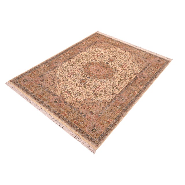 Designed with mesmerizing intricacy and gorgeous color palette, this hand-knotted masterpiece demonstrates the beauty and...