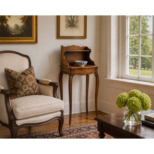 Antique French walnut table de chevet or bedside stand, circa 1890, designed in the Louis XV tradition with slender...