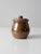 A vintage studio pottery jar, dated 2002 and signed by artist Whitney Rose. Hand-crafted with a rounded organic form, the...