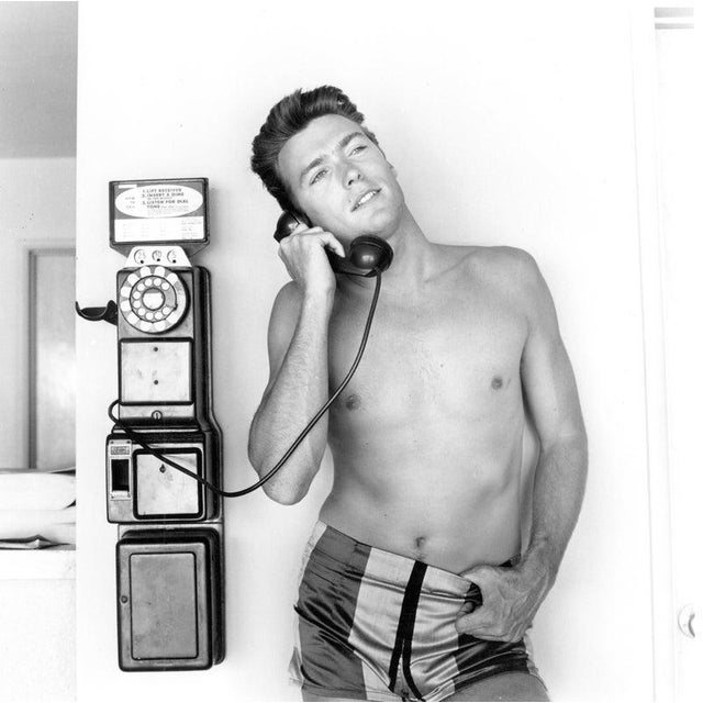 Pay Phone LOS ANGELES - JUNE 1: Actor Clint Eastwood talks on a pay phone outside his home on June 1, 1956 in Los Angeles,...
