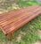 Beautiful and versatile expandable mid century minimalist walnut slat bench designed by John Keal for Brown Saltman, circa...