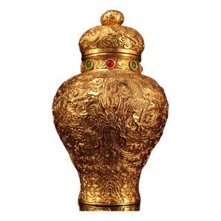 Early 20th Century Ornate Chinese Gilt Bronze Repoussé Dragon Jar With Ruby & Emerald Accents and Cover ("Qianlong" Style) For Sale