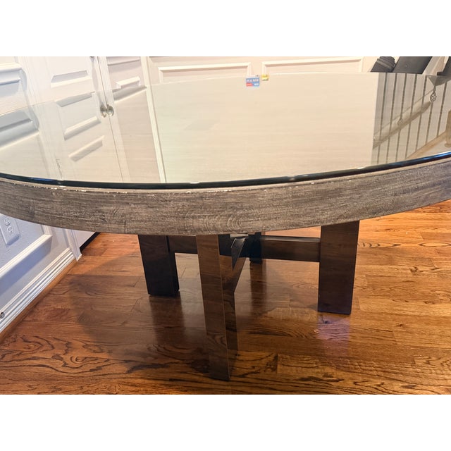 Beautiful RH dining table in a dark grey/charcoal oak finish with sculptural block pedestal base. Includes a custom-cut...
