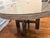 Beautiful RH dining table in a dark grey/charcoal oak finish with sculptural block pedestal base. Includes a custom-cut...