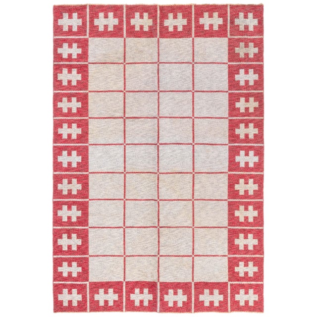 Mid-20th century Swedish flat-weave wool rug Size: 5'3" × 7'7" (160 × 231 cm) A striking example of mid-century...