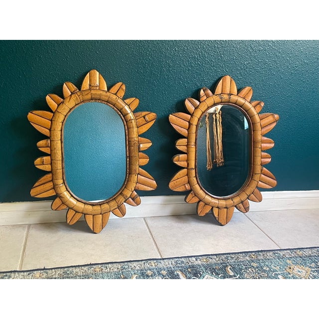 Pair of vintage bamboo wall mirrors with Boho flair! They feature a handcrafted starburst design and can be hung...