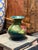 A beautiful vintage Moorcroft Pottery Hibiscus vase, decorated with large hand-painted hibiscus blooms in shades of...