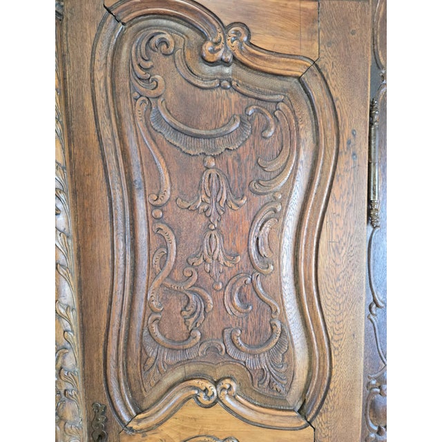 Brown French Carved Oak and Walnut Armoire with Mask and Cartouches, 1700s For Sale - Image 8 of 10