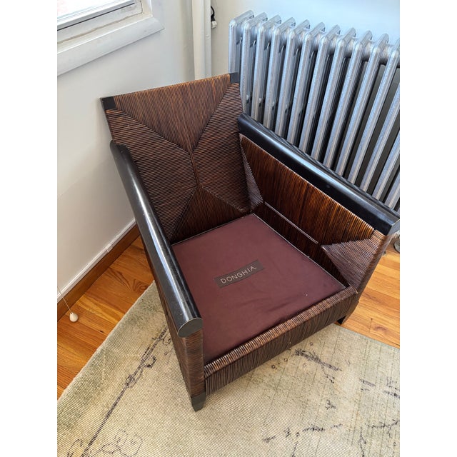Authentic Meruba Chair by John Hutton for Donghia (1990s) in Mahogany and Wicker. Purchased from a longtime Donghia...