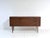 Elegant vintage sideboard in classic mid-century style, dating from the early 1970s. This piece of furniture impresses...