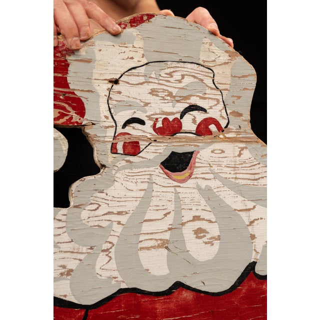Vintage hand-cut and hand-painted plywood Santa Claus decoration made from an Easi-Bild Pattern Company design, circa...