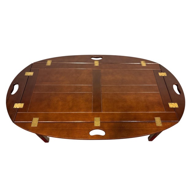 English Butlers Table from 1970s, in mahogany and solid brass. The table top can be used as a tray and is placed on a stand.