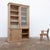 This large antique bookcase dates from the early 20th century. Made primarily of oak, it consists of two superimposed...