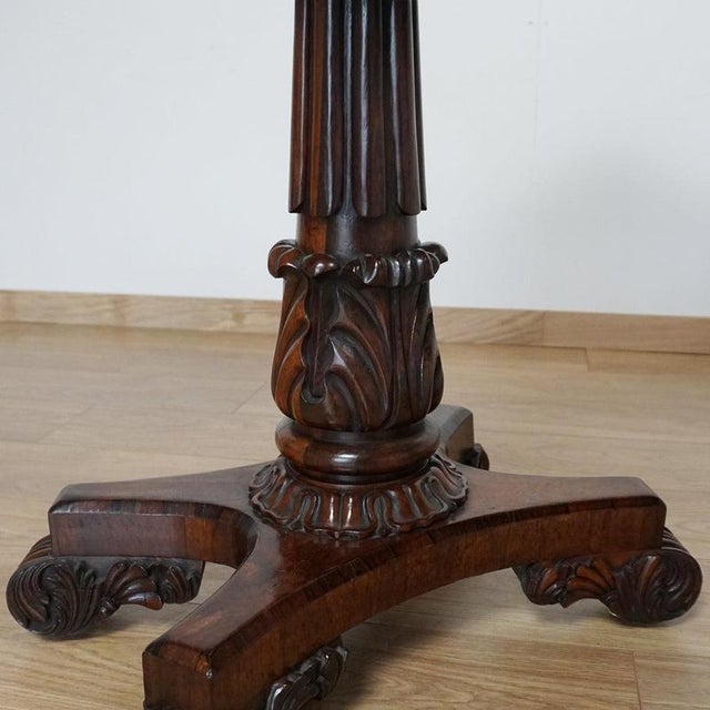 A pair of william iv card tables. Solid and veneered rosewood with classical carved decoration. Dimensions: h 76.cm w 92cm...