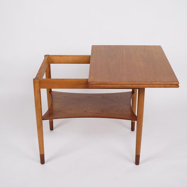Folding table designed by børge mogensen and produced by søborg møbelfabrik in the 1950s. The table is made of teak and...