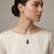 Elevate your jewelry collection with this stunning 14k White Gold Pendant Necklace, featuring a captivating black cat...