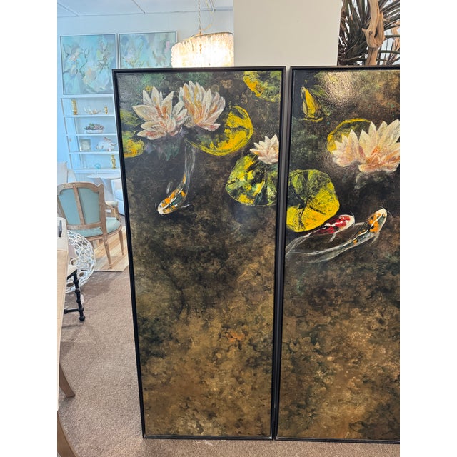Bring tranquility and elegance to your space with this beautifully framed pair of art panels, each depicting a serene pond...