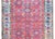 A beautiful early 20th century Persian Malayer rug with an allover trellis floral and leaf patterned field woven in pink,...