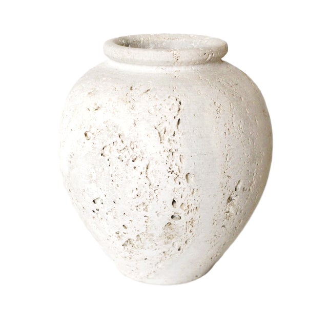 Organic stone Travertine utensil holder, entirely hand craved by skilled artisans. We absolutely love this natural stone...