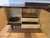 A striking Art Deco sideboard in richly figured Macassar ebony, its glossy French polish showcasing the wood's dramatic...