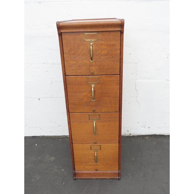 This Unique Large File Cabinet is made of wood, solid wood, solid oak, tiger oak, and veneer. This brilliant File cabinet...
