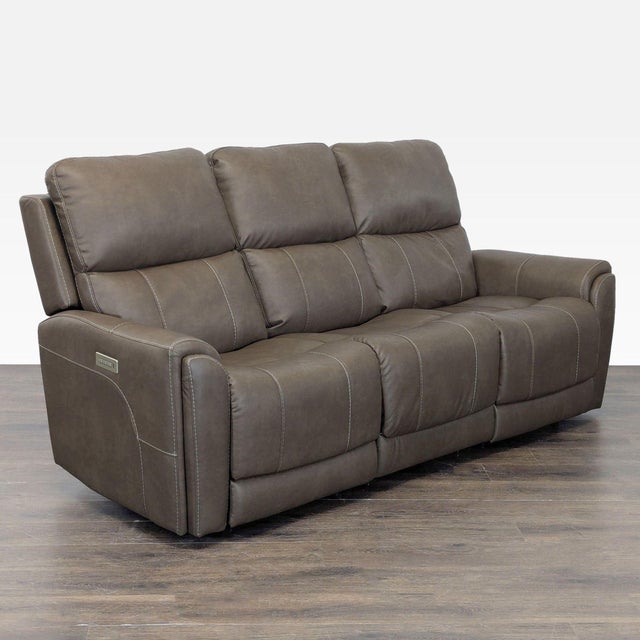 This Flexsteel 3-seat reclining sofa offers great comfort and style for any living room. Upholstered in durable brown...