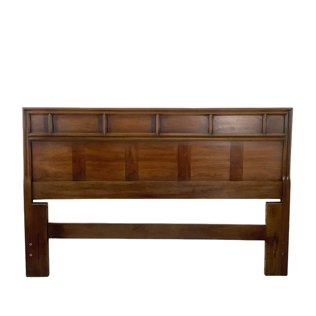 There’s a lot to admire in the layered composition of this walnut headboard — a raised upper gallery of recessed geometric...