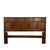 There’s a lot to admire in the layered composition of this walnut headboard — a raised upper gallery of recessed geometric...
