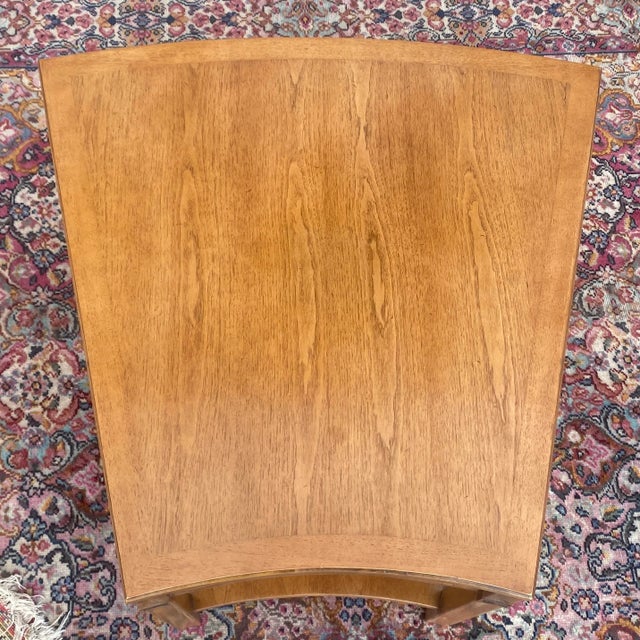A rare wedge shaped side table from the Tamerlane series by Thomasville. Shelf height clearance minimum 11.25” 17” wide...