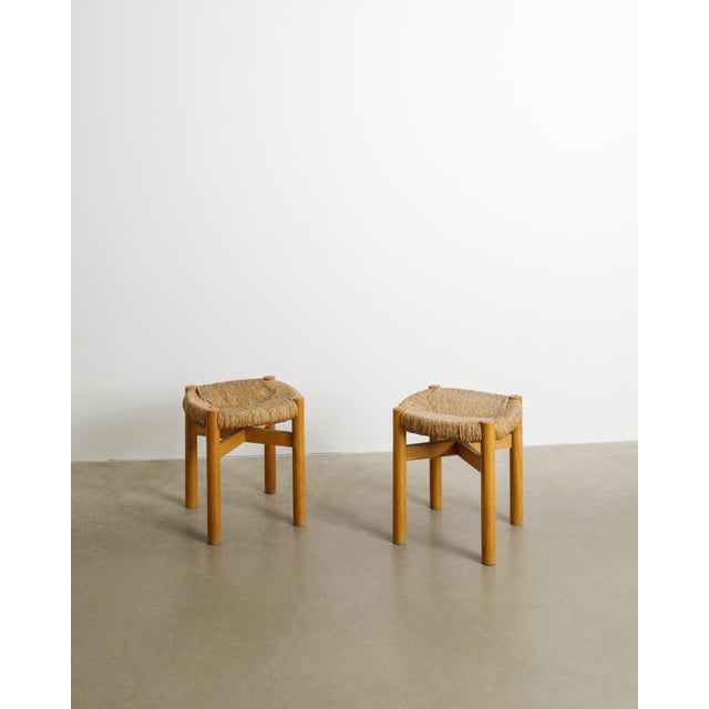Rare pair of french mid century wooden "meribel" stools in ash and original grass straw seats by charlotte perriand for...