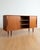 Danish teak sideboard from the 1950s, 180 cm. Three sliding doors with handles carved from solid wood, a typical and...