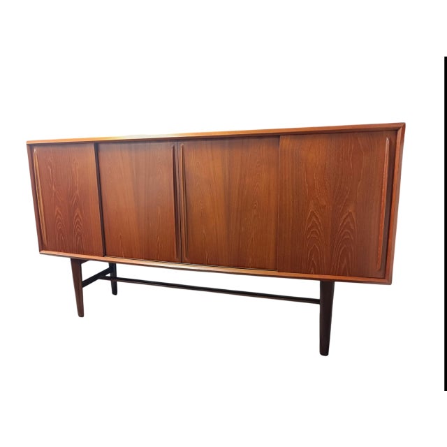 - Designed by Svend Åge Madsen and produced by H.P. Hansen Møbelindustri, Denmark, in the 1960s. - Crafted in teak veneer...