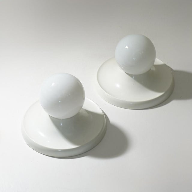 A pair of “Light Ball” ceiling lamps designed by Achille and Pier Giacomo Castiglioni for Flos in the 1960s, an emblematic...