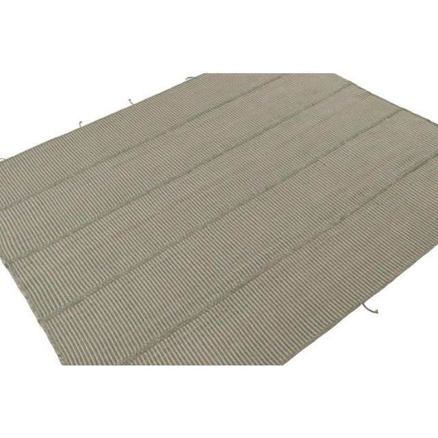 Handwoven in wool, an 8x10 Kilim design from an inventive new contemporary flat weave collection by Rug & Kilim. On the...