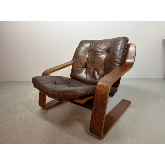 Distinctive plywood lounge chair produced in the Netherlands around 1970. This unknown but highly interesting design...