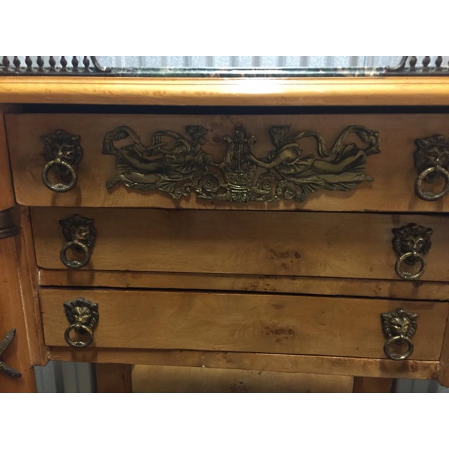 Exquisite pair of sideboards crafted in the Empire Revival style, which gained popularity in the early 20th century as a...