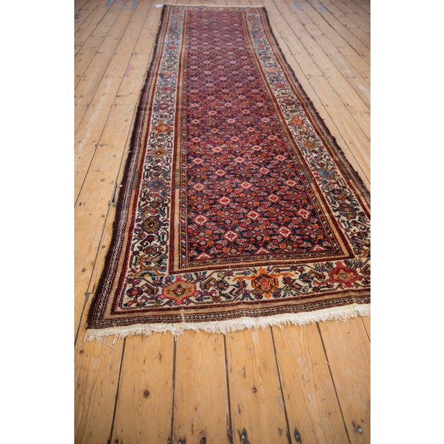 Allover covered field in a Herati motif with small scale and intricate detailing wrapped by a meandering vine and palmette...